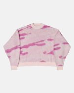 Jersey de punto rosa con estampado de camuflaje.